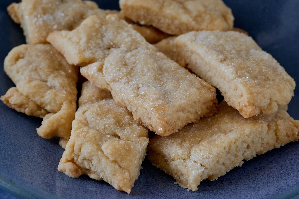 sugared baked pieces of pie crust on a plate